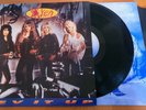 VIXEN - REV IT UP 1990 UK VINYL  EMI USA - MTL 1054 VG+/VG+/VG+