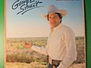 GEORGE STRAIT OCEAN FRONT PROPERTY LP EX SHRINK