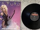 Lita Ford – Out For Blood ; 1983 LP  (VINYL IS EX COVER FAIR)