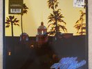 THE EAGLES HOTEL CALIFORNIA VINYL LP RECORD SEALED FREE SHIPPING 180 GRAM