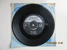 7 inch vinyl  45 rpm 