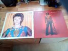 pair of David Bowie 12