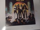 Kiss Kiss - Love Gun (Exclusive Tangerine / Aqua Splatter Colored Vinyl) NM