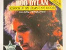 Bob Dylan Knocking on Heaven's Door Two Versions Original and Live at Budokan