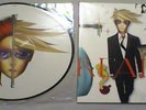 DAVID BOWIE REALITY ORANGE VINYL/ REBEL NEVER GETS OLD 12'' PICTURE DISC BUNDLE