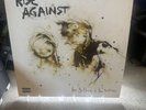 The Sufferer and the Witness by Rise Against (Record, 2006)