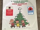 A Charlie Brown Christmas Red Glitter Vinyl Album by Vince Guaraldi Record 2021