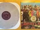 Beatles - Sgt. Pepper's Lonely Hearts Club Band. 1978 Gray/Pink Marble edition.