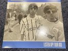 Oasis Listen Up Our Kid Vinyl LP