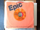 vinyl 45.  Suzy and the Red Stripes (McCartney). Seaside Woman.  red vinyl PROMO