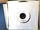 vinyl 45.  Paul McCartney. probably Letting Go.   '70s Capitol TEST PRESSING.