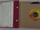 The Beatles collection of 18 Capitol/Apple vinyl singles (45s) in vintage holder