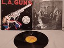 L.A. Guns Cocked & Loaded 12