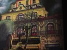 Iron Maiden vinyl record with poster and postcard