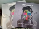 SIMPLE MINDS - WALK BETWEEN WORLDS. VINYL LP WITH LIMITED SIGNED PRINT