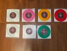 7 Beatles 45 rpms. Colored/Clear Vinyl. Jukebox Only. Mint. Never Played