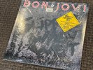 Bon Jovi Slippery When Wet vinyl LP with shrink & hype sticker & red sleeve