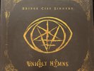 BRIDGE CITY SINNERS UNHOLY HYMNS HAND POURED GOLD BLUE SWIRL. NUMBER 148/277