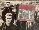 U2 Unforgettable Fire Case Only.         With Free Purple Marble Album