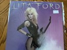 Lita Ford  5 Vinyls, One Banned Cover And A Signature On Another.