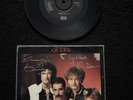 QUEEN “Radio Ga Ga/I Go Crazy” Signed 7” FREDDIE MERCURY BRIAN MAY TAYLOR DEACON