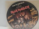 IRON MAIDEN. RUN TO THE HILLS. 7