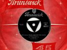 Bill Haley And His Comets:(We're gonna) rock around the clock:UK Brunswick:1954