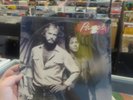 Pages/Pages SEALED U.S. LP (with punch hole)