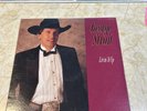 George Strait. Livin' It Up. G+ Vinyl LP. 1990 Original. Plays VG. VG+ Cover.