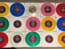 Beatles Set of 15 color vinyl singles labeled 