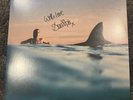 signed radical optimism (deluxe blue/white split vinyl) - autographed dua lipa