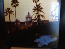 Vinyl Record LP The Eagles Hotel California Signed By Glenn Frey on label.