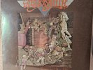 Aerosmith Toys In The Attic Unopened 1975, Includes Black Matte Hanging Frame
