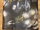 Analog signed 12 inch record in good condition DEAD OR ALIVE / something in my