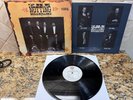 The Notting Hillbillies Missing... Presumed Having a Good Time LP 1990 Warner EX
