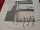 Dire Straits Self-titled LP Signed By Four .