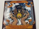 Dio – Sacred Heart (SIGNED BY RONNIE JAMES DIO AND CRAIG GOLDY)