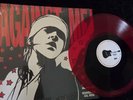 Against Me  ‎– Reinventing Axl Rose:  Red Translucent W/ Black Blob